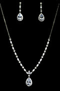 Three-piece teardrop crystal set featuring necklace, earrings, and bracelet with brilliant teardrop centers, product view…