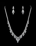 Marquise crystal necklace-and-earring set featuring graceful graduated design with leaf-like stones, product view at…