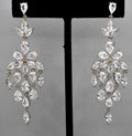 Marquise crystal chandelier earrings featuring layered leaf-shaped stones in a luminous statement drop, product view at…