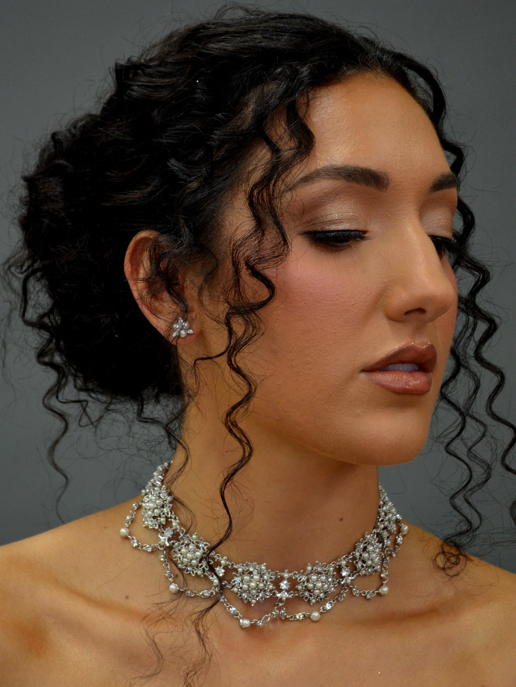Pearl and crystal scalloped choker featuring close-fitting scalloped design with luminous pearl accents, product view at…
