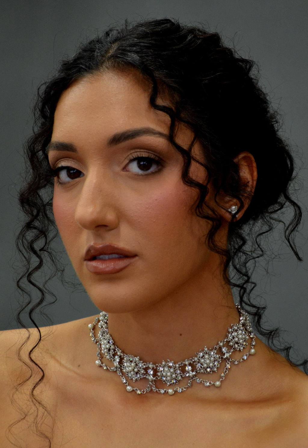 Pearl and crystal scalloped choker featuring close-fitting scalloped design with luminous pearl accents, detail view at…