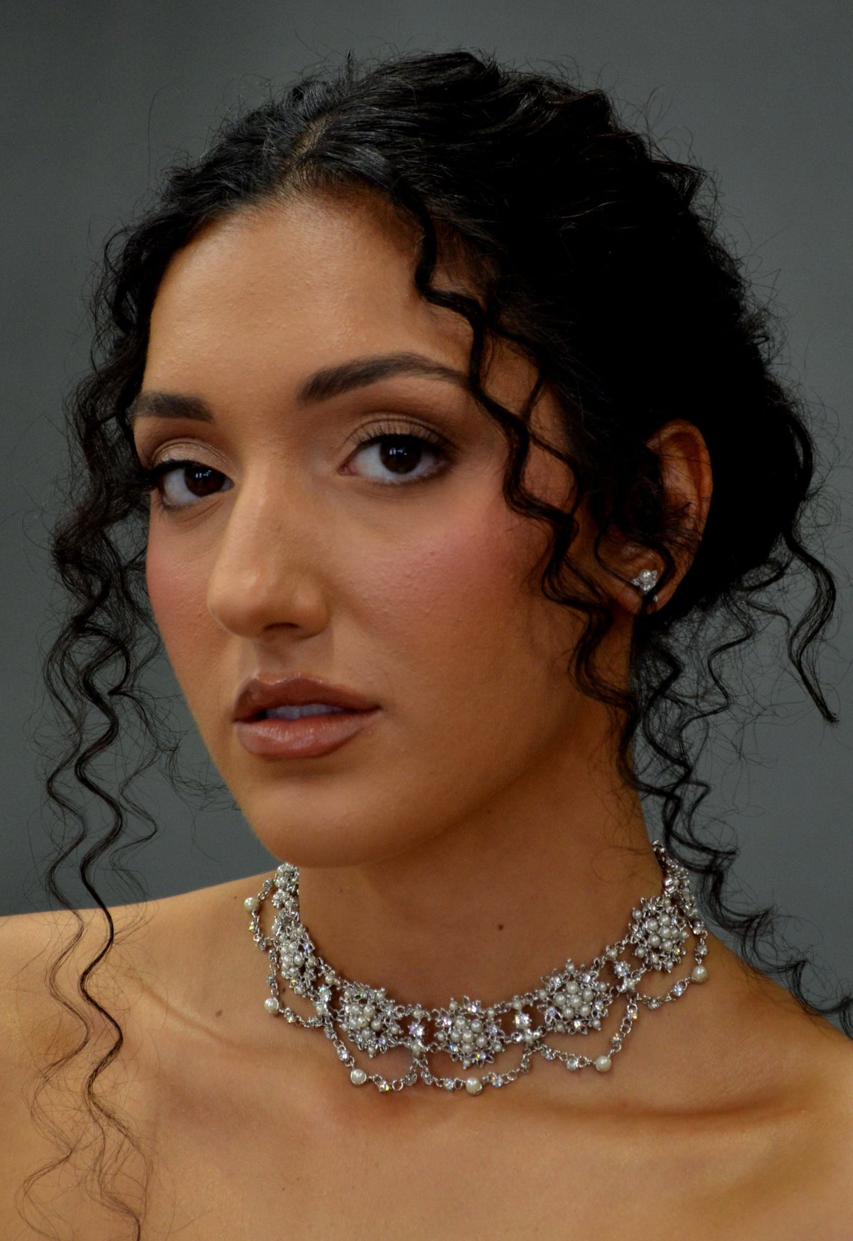 Pearl and crystal scalloped choker featuring close-fitting scalloped design with luminous pearl accents, detail view at…