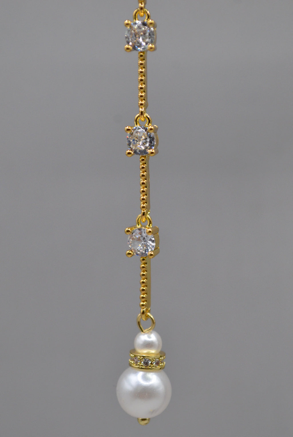 Long pearl and crystal earrings featuring fine linear drop finished with a petite pearl, alternate view at Rebecca’s…