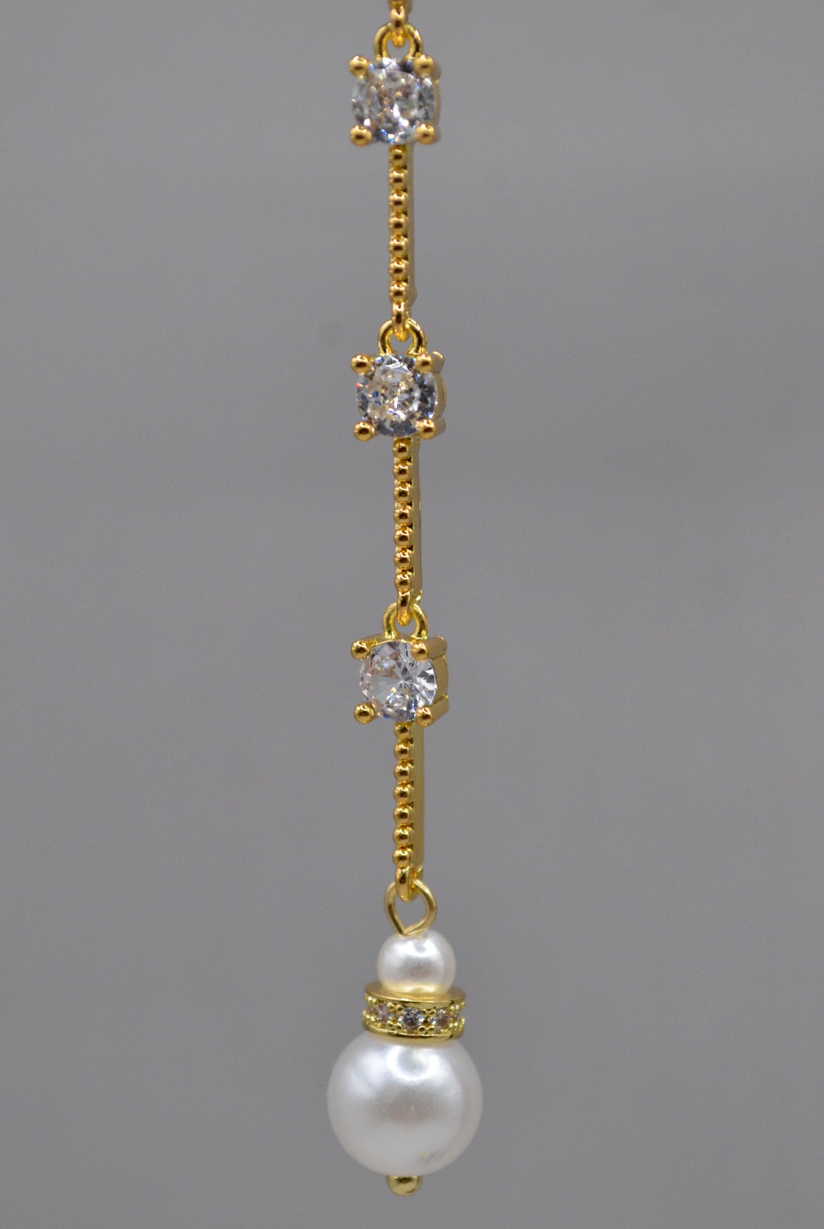 Long pearl and crystal earrings featuring fine linear drop finished with a petite pearl, alternate view at Rebecca’s…