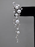 Pearl and crystal cluster earrings featuring floral cluster of pearls and clear stones in a romantic drop silhouette,…