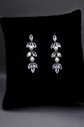 Petite crystal leaf earrings featuring compact botanical cluster with a subtle drop silhouette, product view at Rebecca’s…