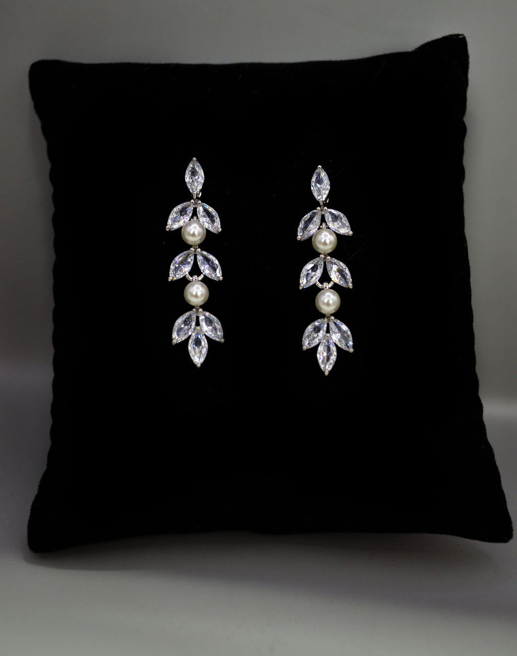 Petite crystal leaf earrings featuring compact botanical cluster with a subtle drop silhouette, alternate view at Rebecca’s…