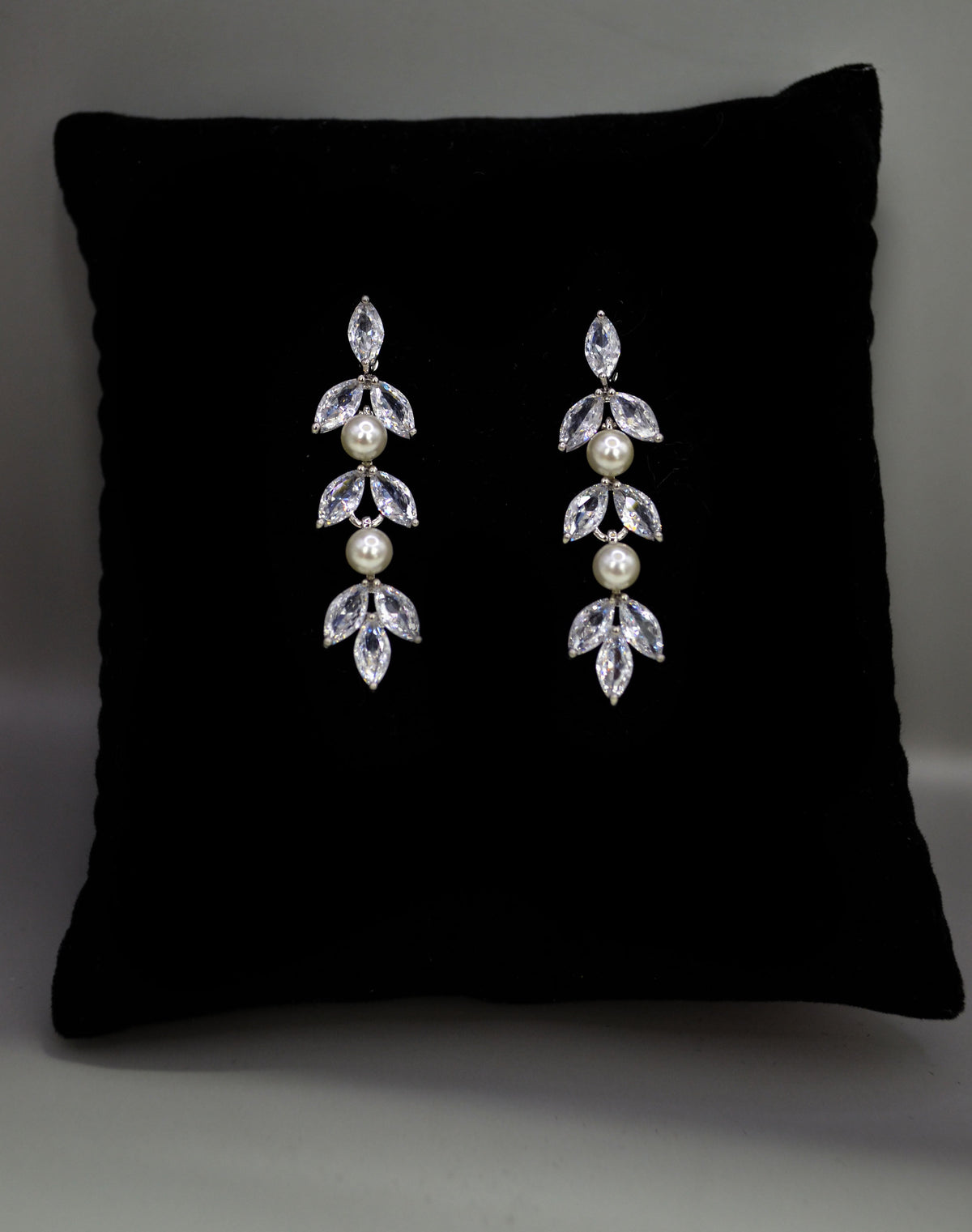 Petite crystal leaf earrings featuring compact botanical cluster with a subtle drop silhouette, alternate view at Rebecca’s…