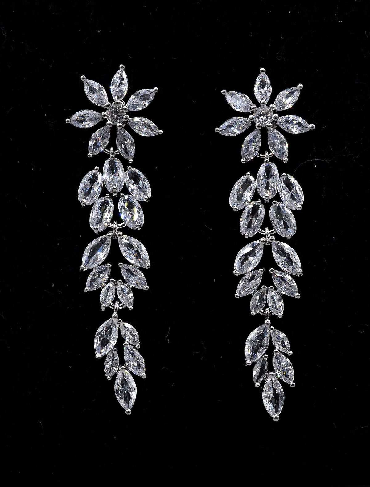Crystal leaf cascade earrings featuring long botanical drop of marquise-cut stones, product view at Rebecca’s Louisville