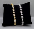 Baguette and crystal cluster bracelet featuring alternating square and round stones in a polished tennis silhouette,…