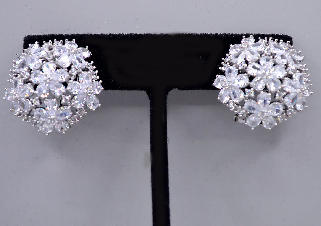 Crystal flower cluster studs featuring full dimensional bloom made from marquise-cut stones, product view at Rebecca’s…