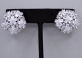 Crystal flower cluster studs featuring full dimensional bloom made from marquise-cut stones, product view at Rebecca’s…