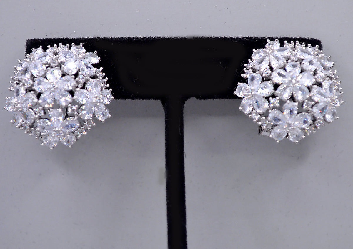 Crystal flower cluster studs featuring full dimensional bloom made from marquise-cut stones, product view at Rebecca’s…