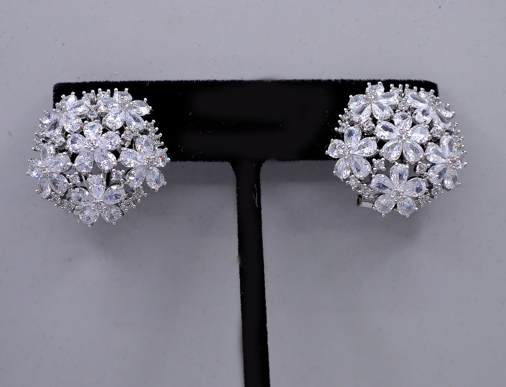 Crystal flower cluster studs featuring full dimensional bloom made from marquise-cut stones, detail view at Rebecca’s…