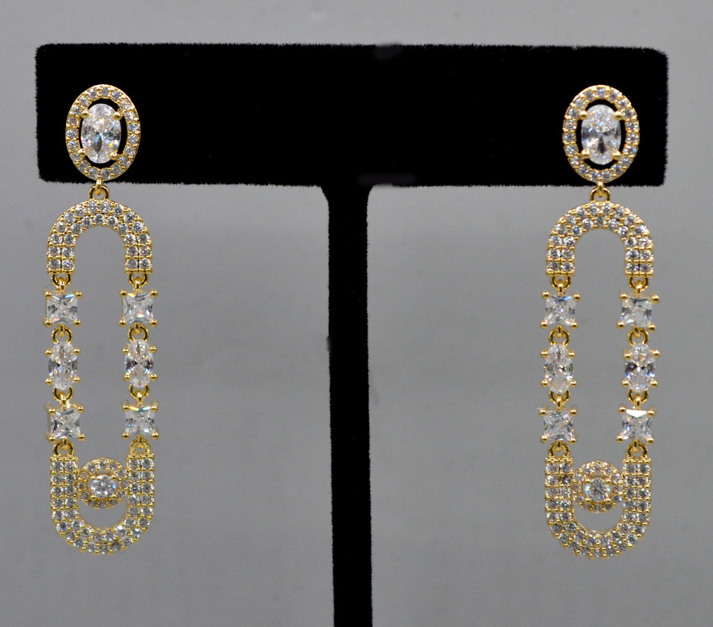 Double-loop crystal earrings featuring elongated linked loops covered in petite sparkling stones, alternate view at…