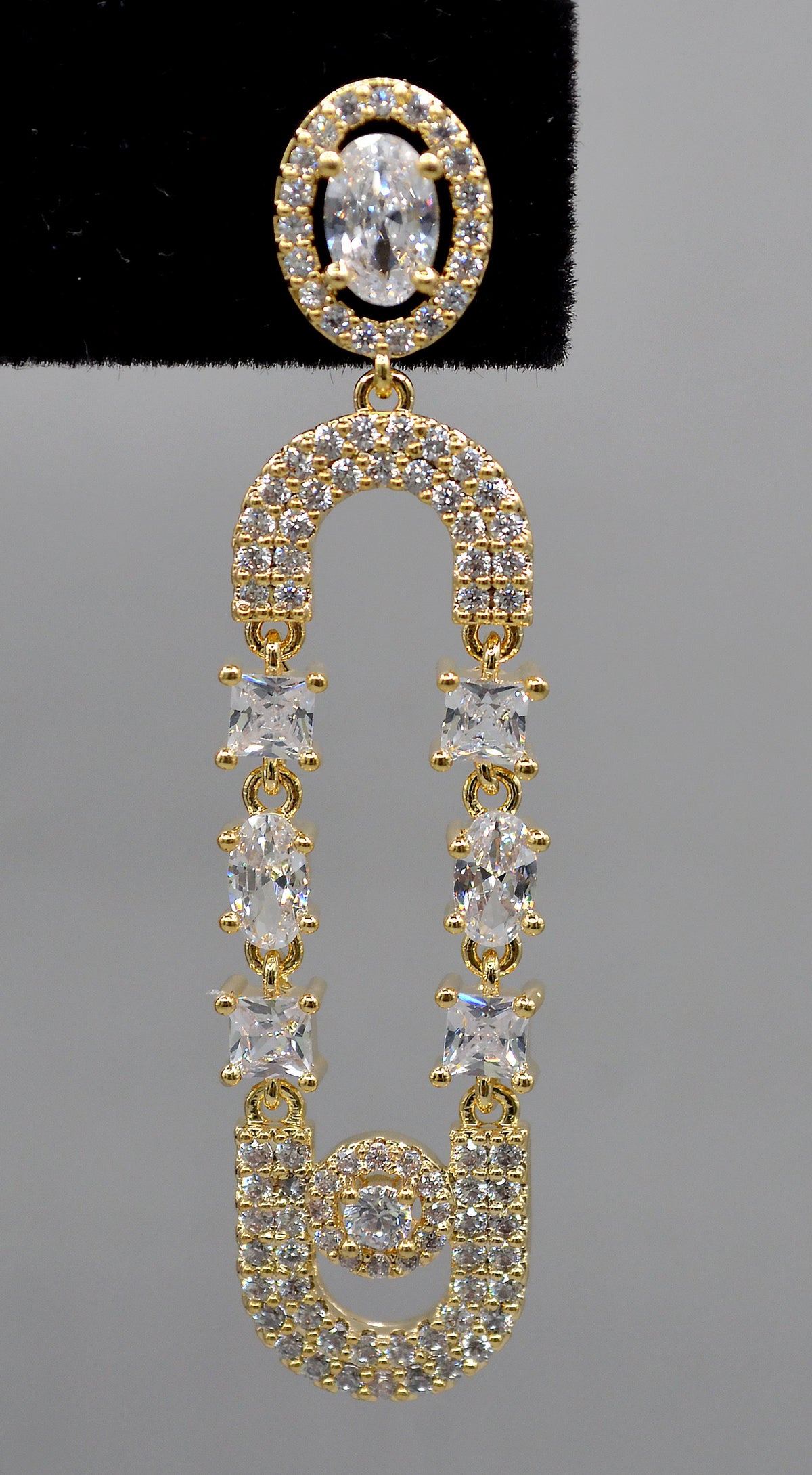 Double-loop crystal earrings featuring elongated linked loops covered in petite sparkling stones, view 5 at Rebecca’s…