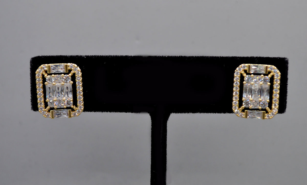 Square halo crystal studs featuring baguette-framed square center with a polished, architectural look, alternate view at…