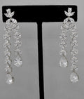 Double-drop crystal earrings featuring airy geometric chain of square and round stones, alternate view at Rebecca’s…