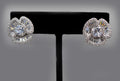 Baguette halo crystal studs featuring round center framed by dimensional baguette-cut stones, product view at Rebecca’s…