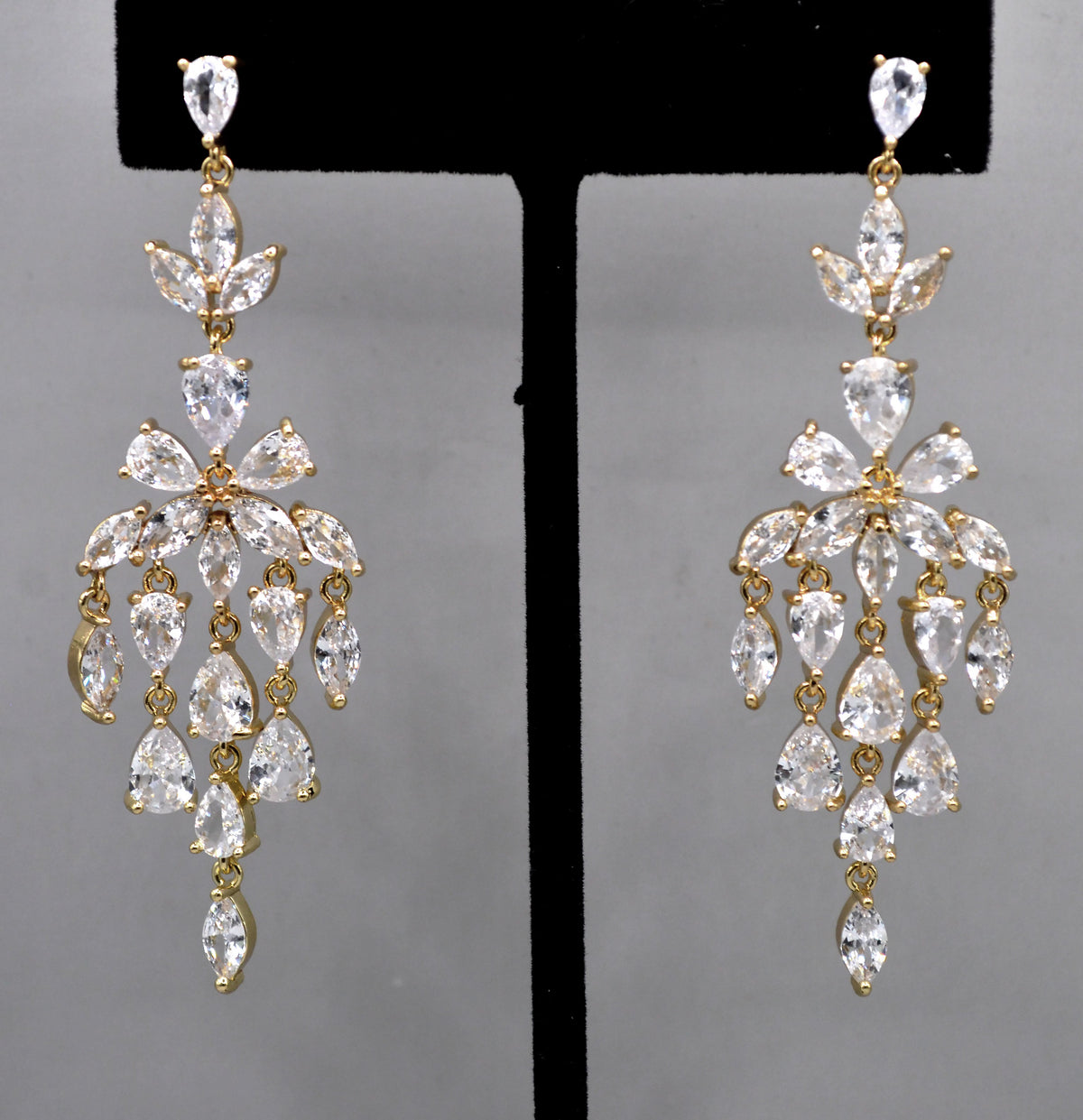 Marquise crystal chandelier earrings featuring layered leaf-shaped stones in a luminous statement drop, alternate view at…