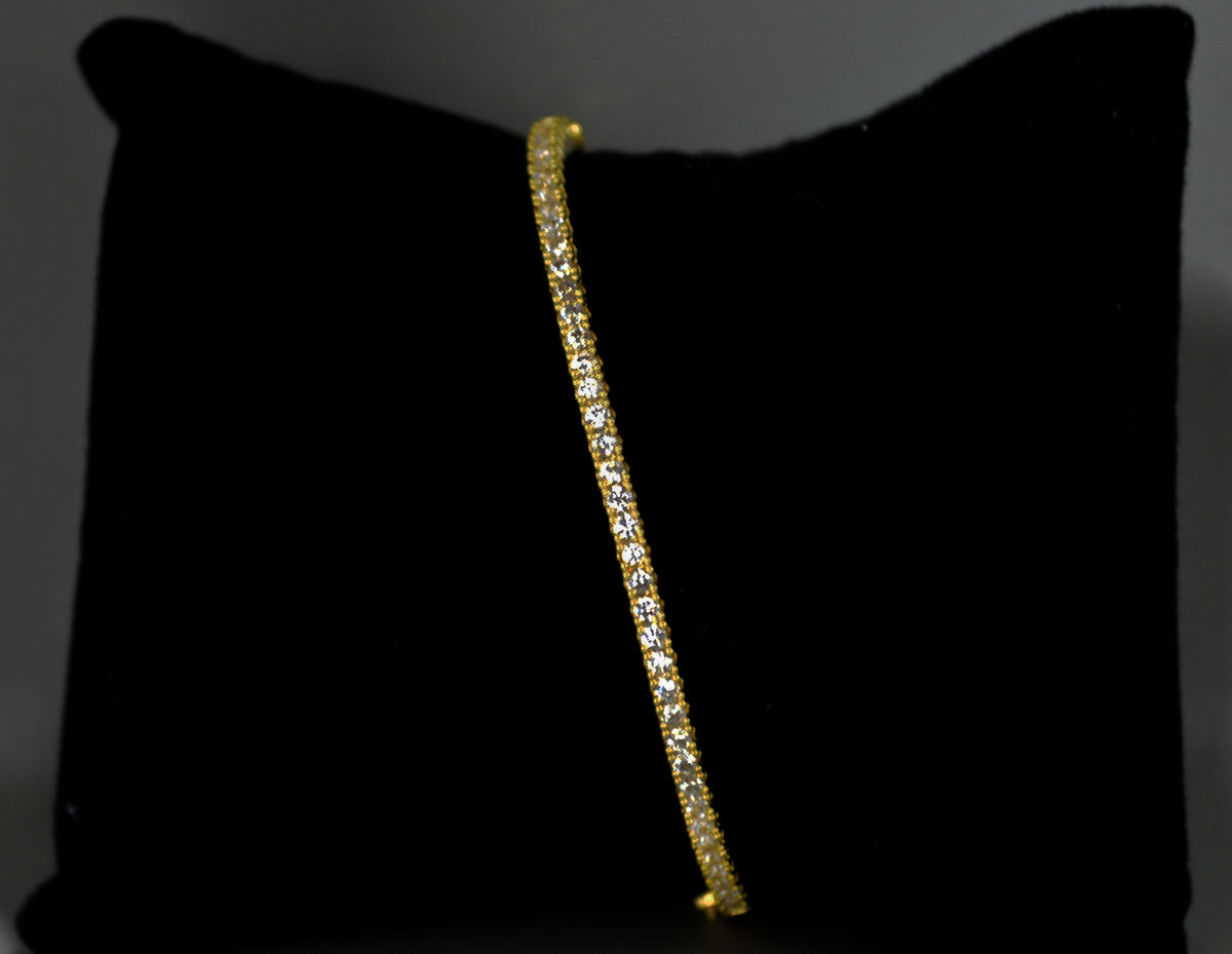 Slim crystal bridal bangle featuring fine row of petite stones for understated sparkle, product view at Rebecca’s Louisville
