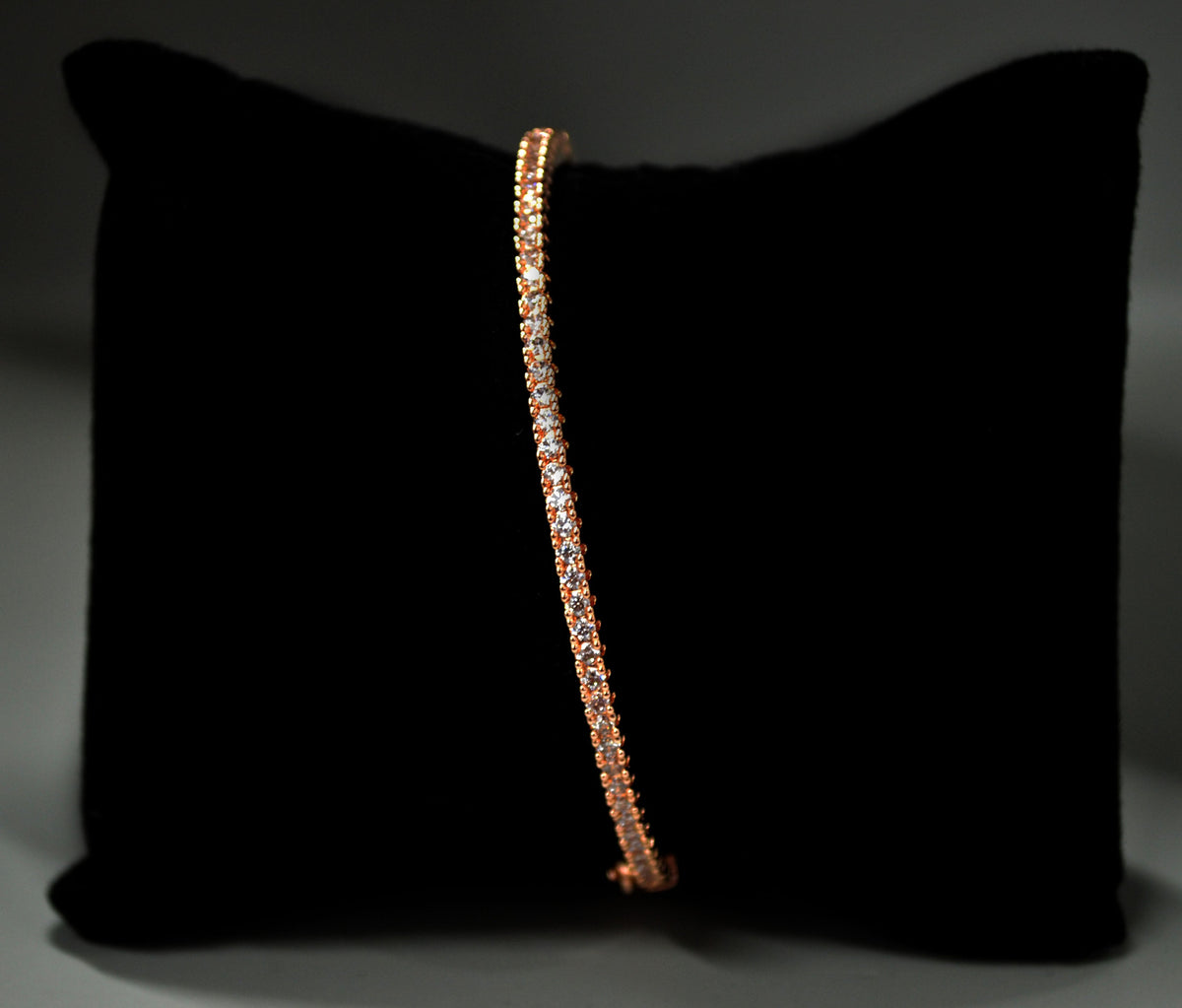 Slim crystal bridal bangle featuring fine row of petite stones for understated sparkle, alternate view at Rebecca’s…