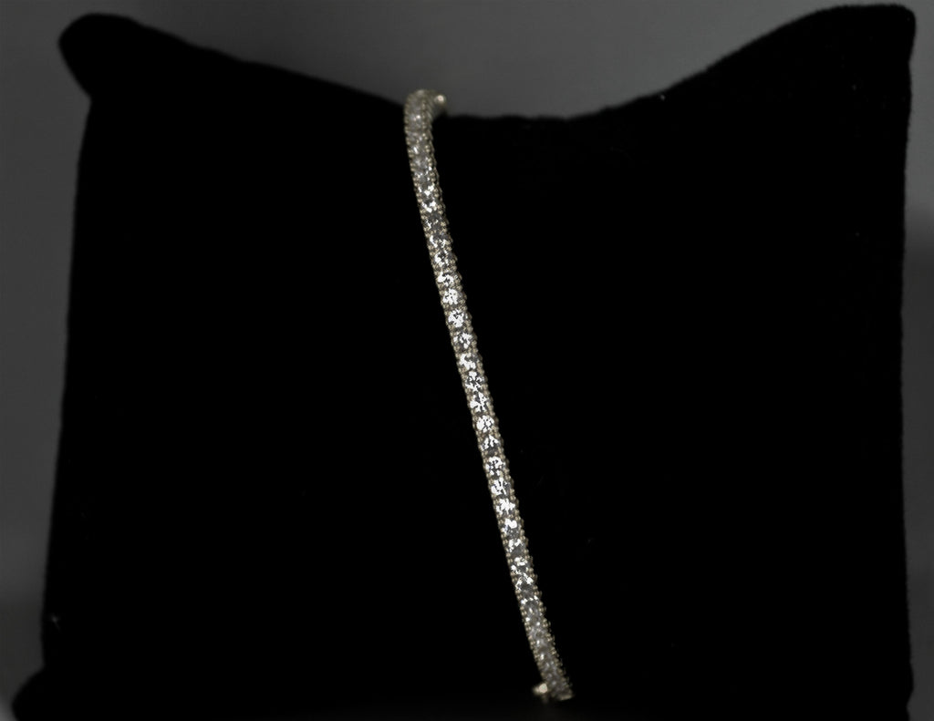 Slim crystal bridal bangle featuring fine row of petite stones for understated sparkle, detail view at Rebecca’s Louisville